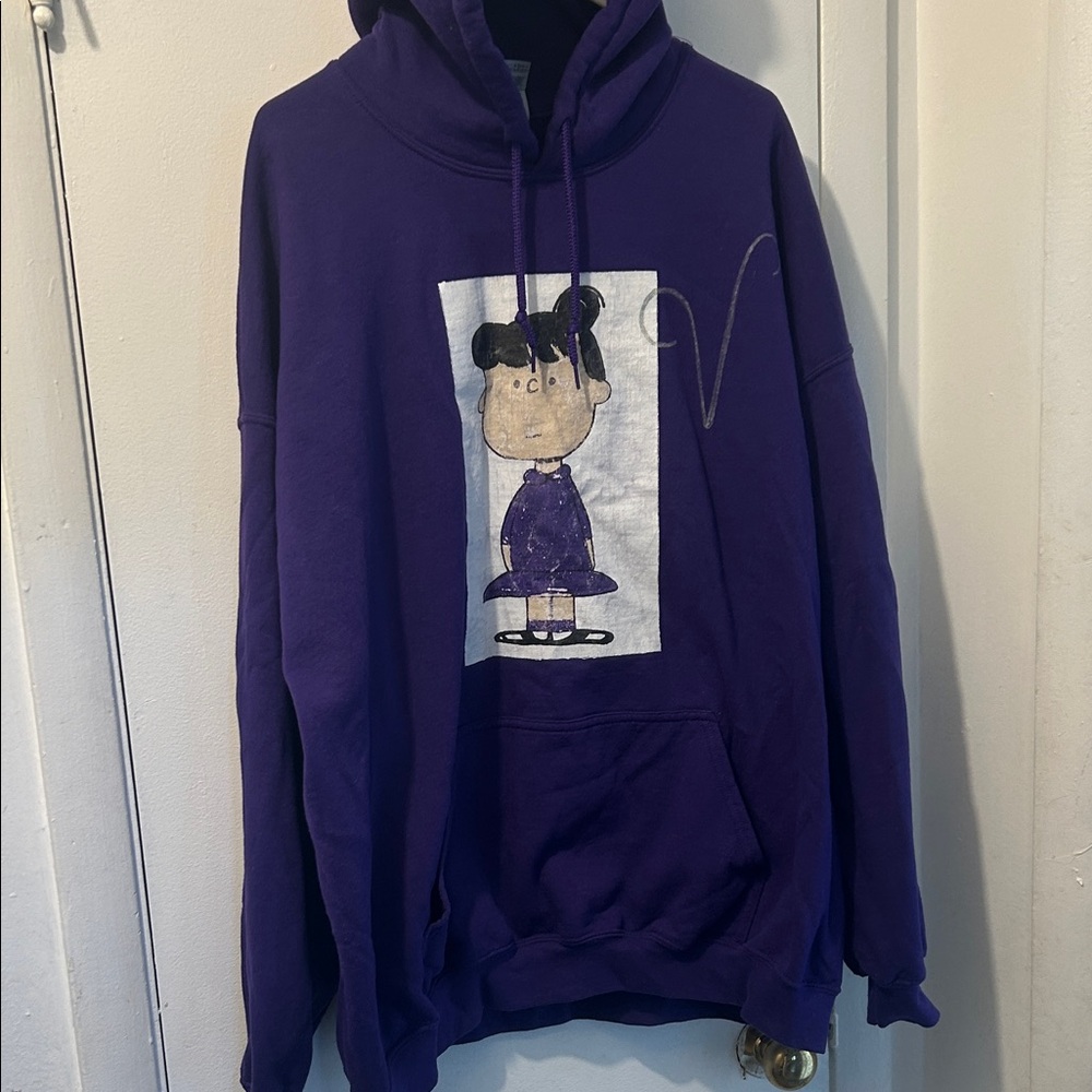 Purple Hoodie with Cartoon Graphic